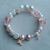 Peach pink Swarovski crystals and pearls in varying shades and sizes
