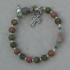 Unakite with sterling silver spacers and pewter cross and heart charm.