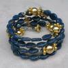 Blue lapis teardrops with gold plated Paters and accents and Montana blue Swarovski crystals.